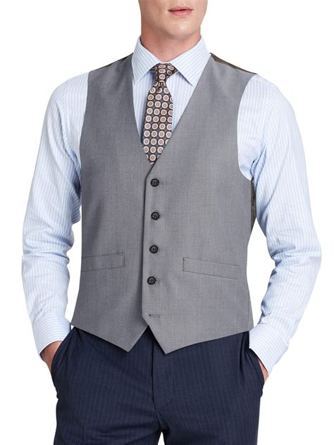 men wearing waistcoats and vests.